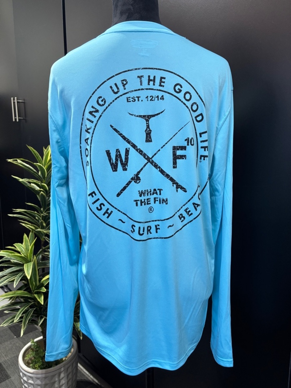 What The Fin UPF 50+ antimicrobial,fast dry,unisex logo back performance fabric